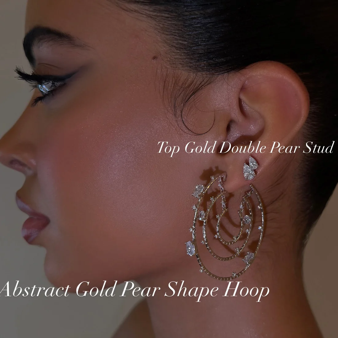 Abstract Gold Pear Shape Hoop - Image 2