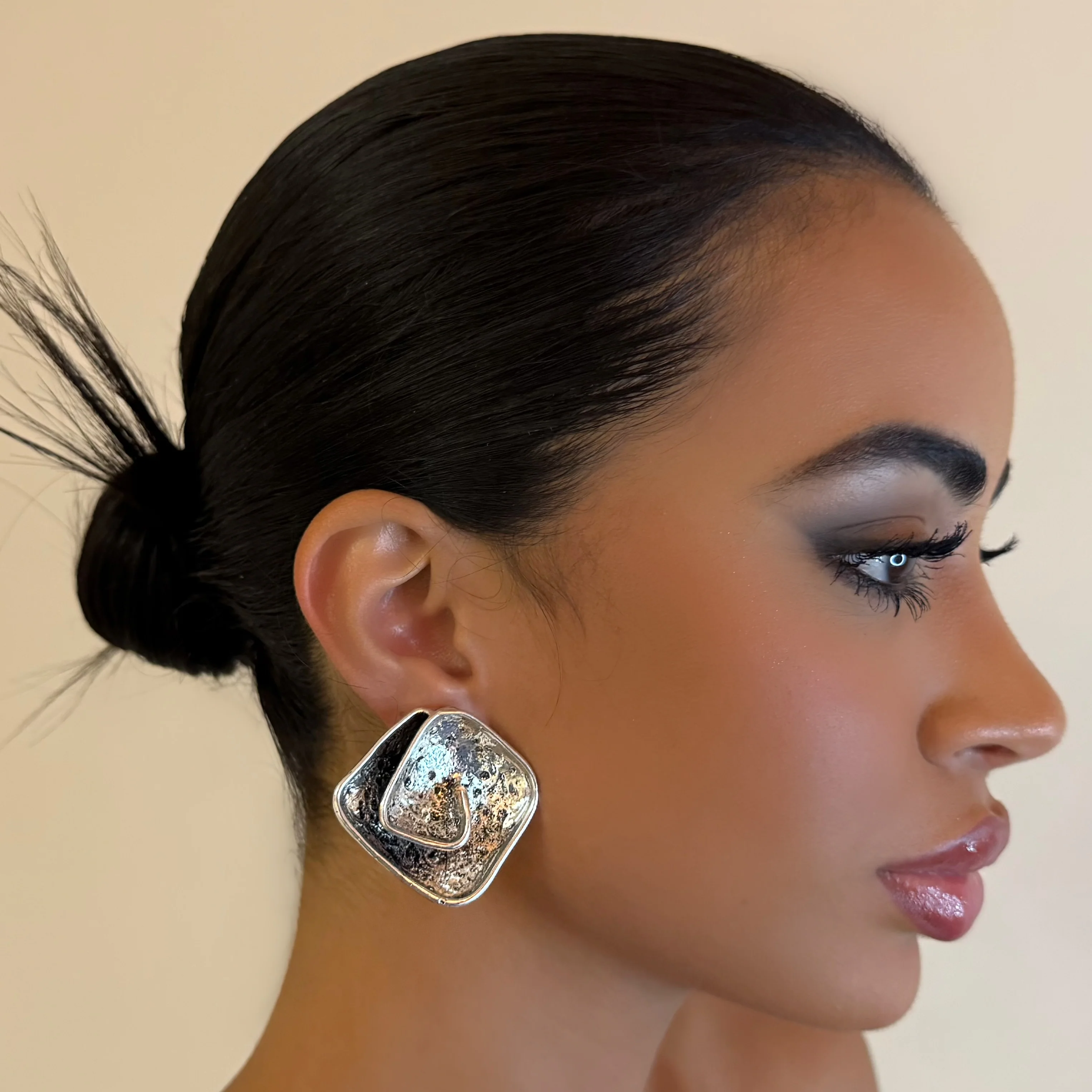 The Chrome Swirl Stud