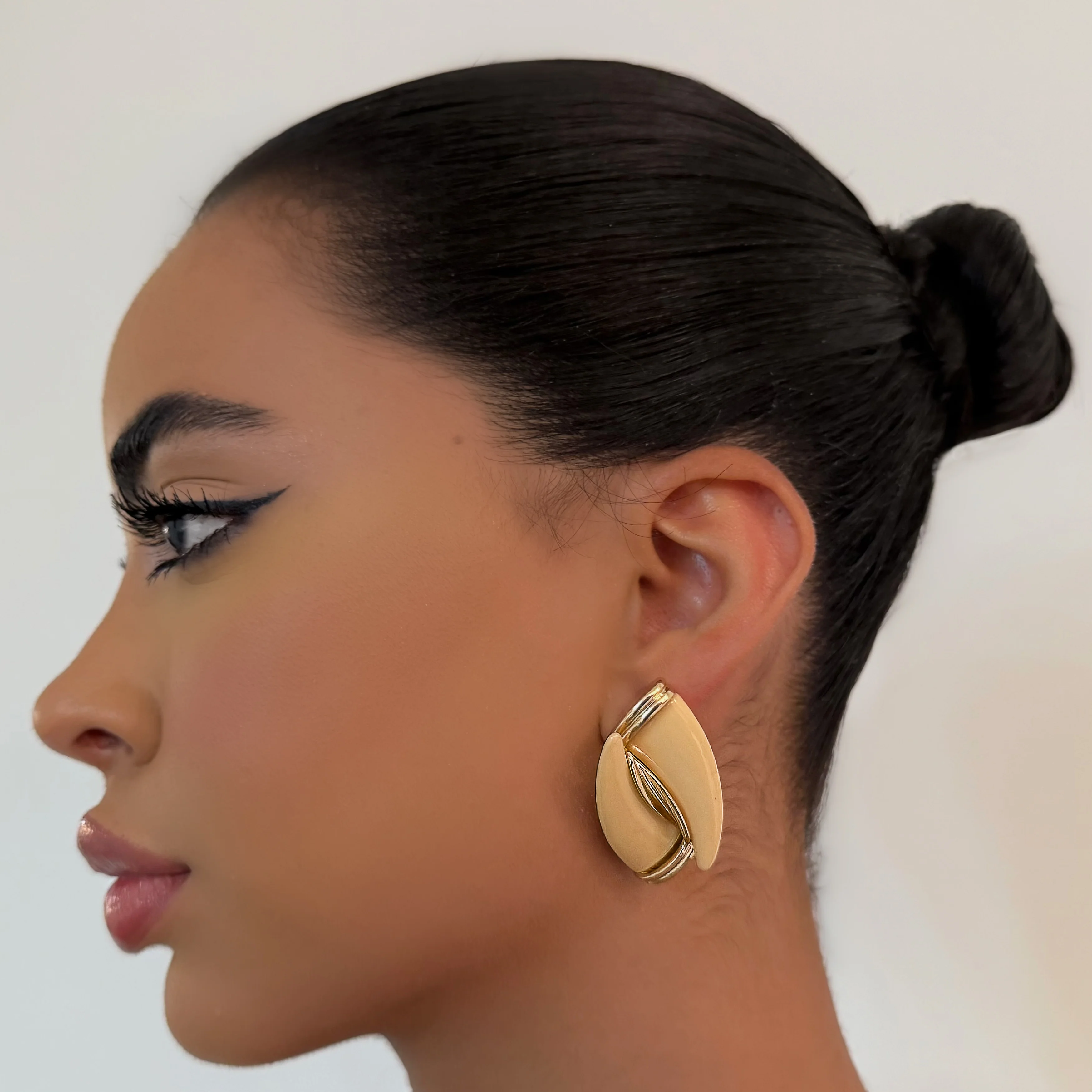 The Nude Horn Studs