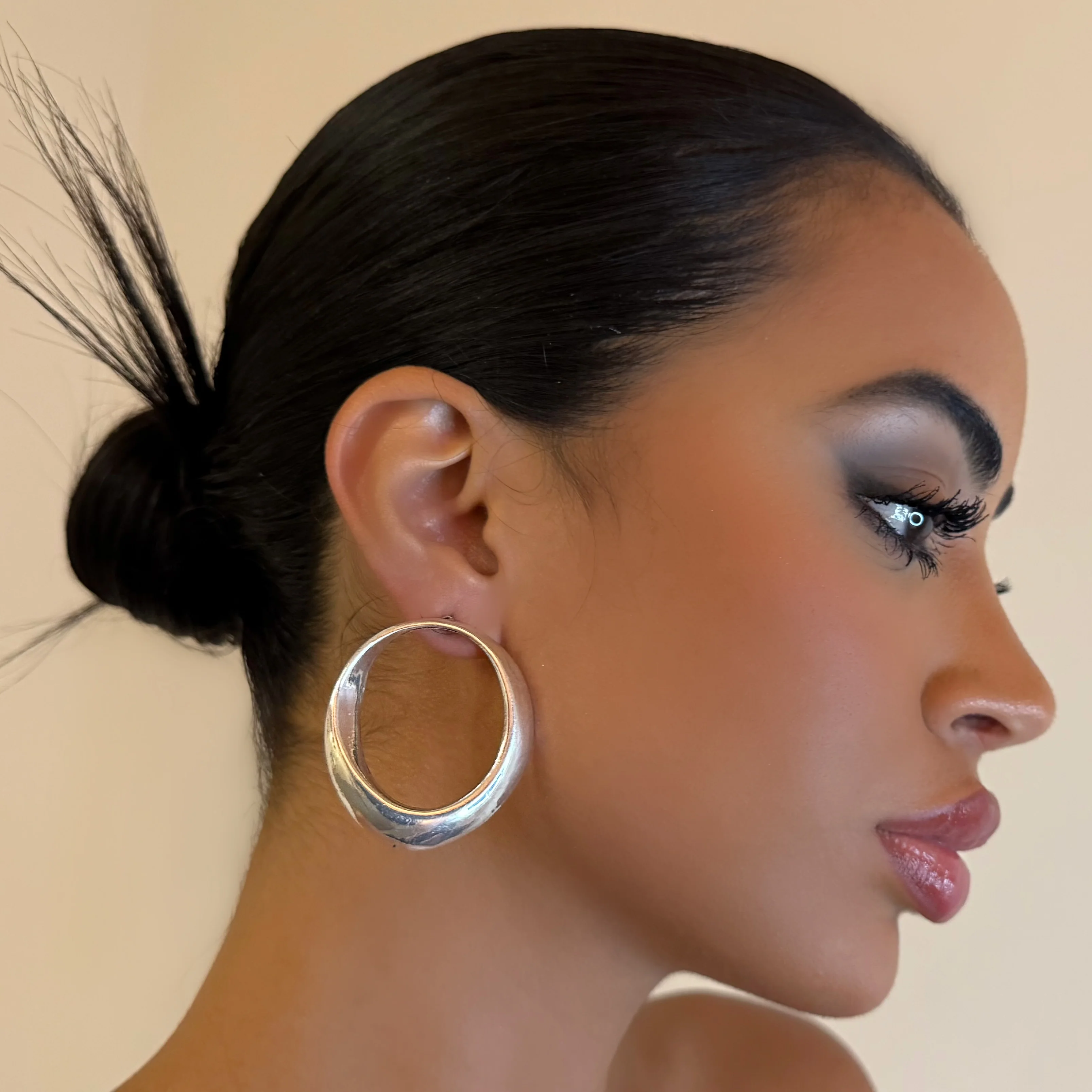 The Silver Circular Stud