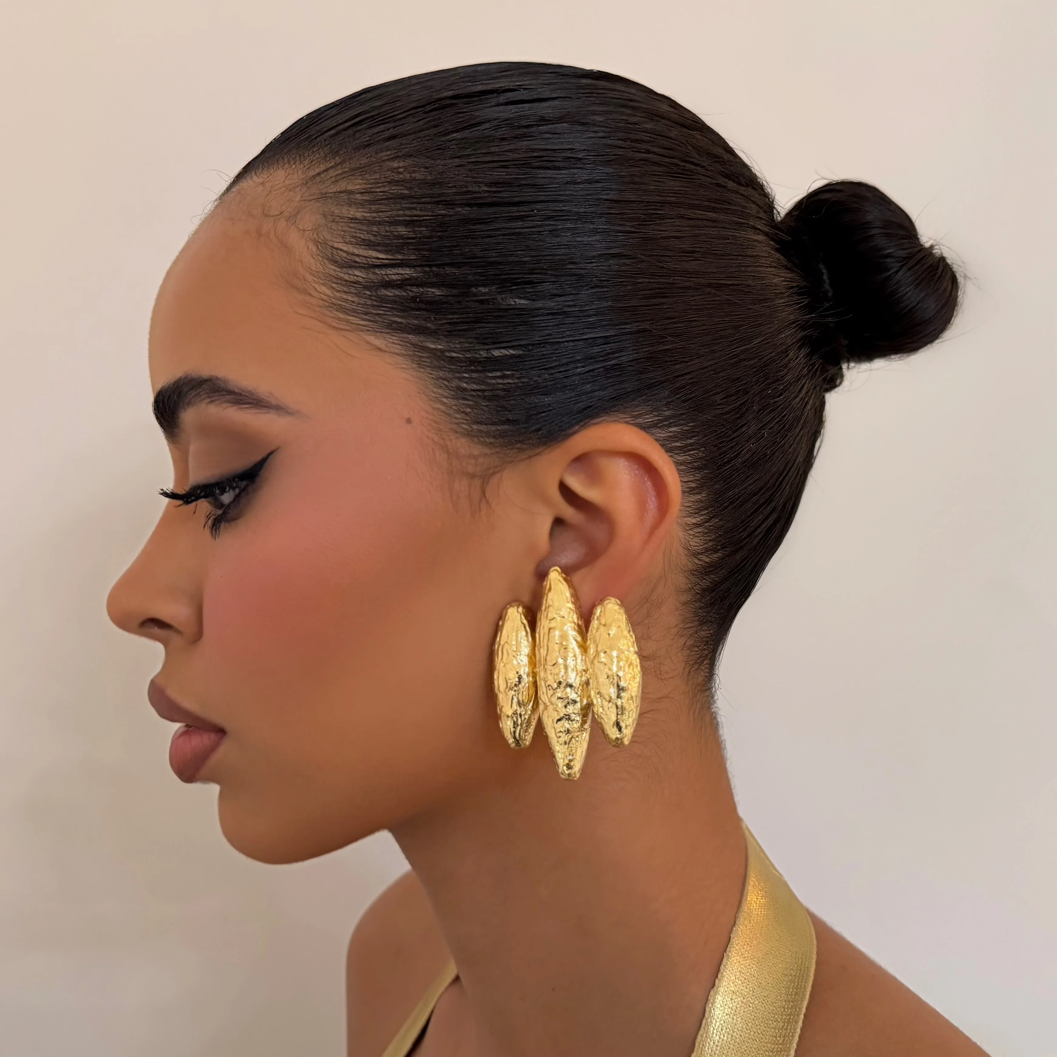 The Triple Gold Stud